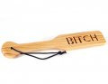 WOOD PADDLE WITH WORD "BITCH" IMPRINT